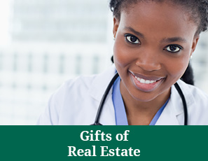 A doctor smiling. Gifts of Real Estate Rollover