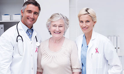 Photo of two doctors and a patient